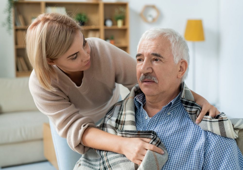 careful-and-affectionate-daughter-taking-care-of-her-sick-senior-father-at-home-e1673752980828